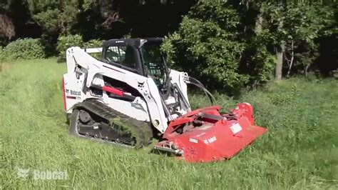 youtube bobcat skid steer with flail mower|bobcat flail mower.